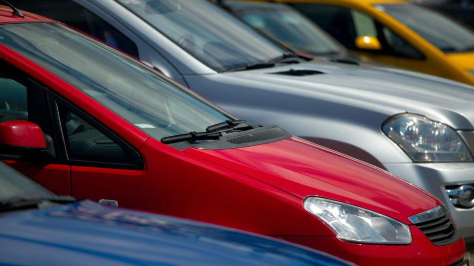 Cars parking in a row